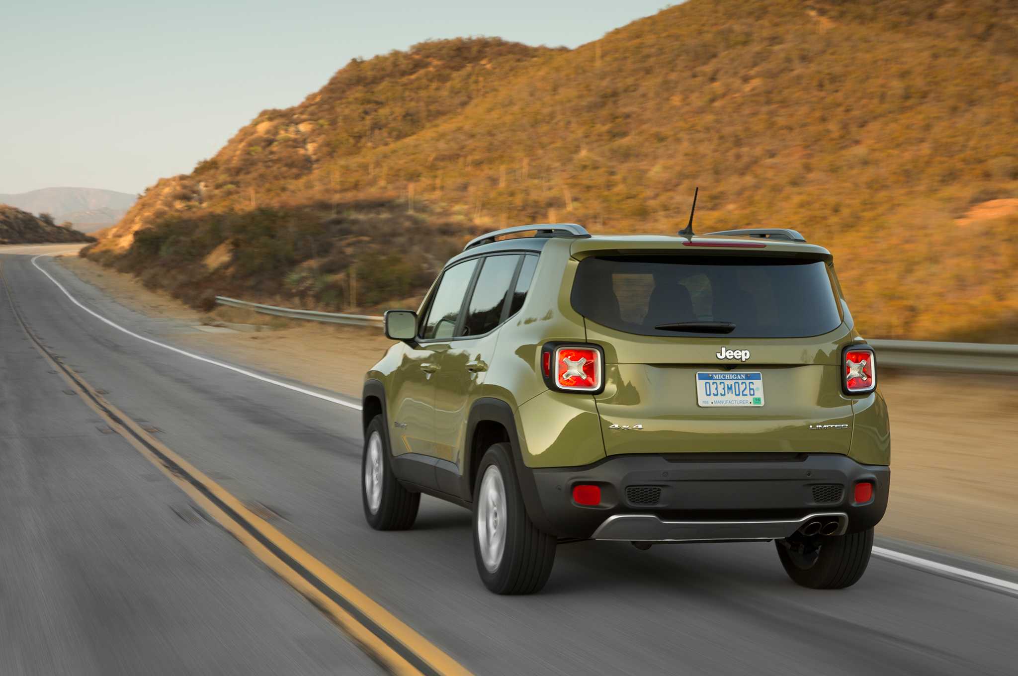 2015 Jeep Renegade Limited Rear Three Quarter In Motion 1